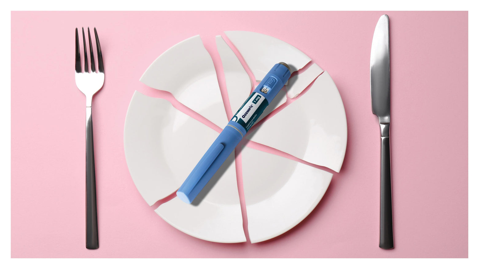 A person holding a GLP-1 injection pen next to an empty plate and a cup of coffee