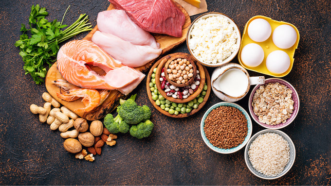 High-protein foods arranged on a table with a morning coffee